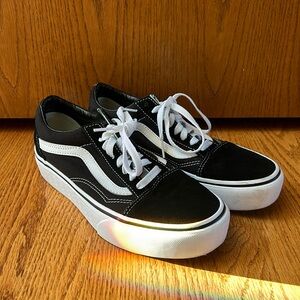 Black Vans sneakers